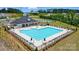 Aerial image of the large community pool with lounge seating and umbrellas, near the clubhouse at 1453 Ardmore Dr # 240, Sherrills Ford, NC 28673