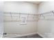 Spacious walk-in closet offers ample storage with wire shelving and a convenient mirror at 1453 Ardmore Dr # 240, Sherrills Ford, NC 28673