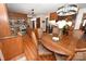 Kitchen features granite countertops, stainless steel appliances, wood floors, and a breakfast nook at 1793 Fairway Dr, Newton, NC 28658