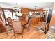 Bright kitchen with granite counters, wood cabinets, stainless steel appliances, and breakfast nook at 1793 Fairway Dr, Newton, NC 28658