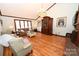 Elegant living room with hardwood floors, vaulted ceiling, and a large bay window at 1793 Fairway Dr, Newton, NC 28658