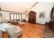 Elegant living room boasts hardwood floors, a chandelier, and a traditional cabinet at 1793 Fairway Dr, Newton, NC 28658