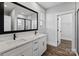 Bright bathroom with double vanity, quartz countertops, and walk-in shower at 2081 Fordhill St, Rock Hill, SC 29732