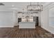 Beautiful kitchen with white cabinets, stainless appliances, and a large island with pendant lighting at 2081 Fordhill St, Rock Hill, SC 29732