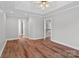 Large bedroom with tray ceiling and access to the hall at 2082 Egret Ct, Rock Hill, SC 29732