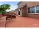 Wide angle shot of a large deck featuring bench seating and a view of the brick house at 2082 Egret Ct, Rock Hill, SC 29732