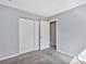 Bedroom featuring carpet, gray walls and a closet at 2406 Brook Canyon Dr, Charlotte, NC 28212