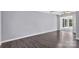 Living room featuring dark floors and a view into the sunroom at 2406 Brook Canyon Dr, Charlotte, NC 28212