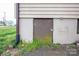 Exterior basement door with some green ground cover visible at 2915 Spencer Ne Rd, Conover, NC 28613