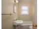 Small bathroom with a combined shower and tub at 2915 Spencer Ne Rd, Conover, NC 28613