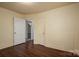 Bedroom with hardwood floors, and white doors at 2915 Spencer Ne Rd, Conover, NC 28613