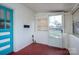 Sunroom with a blue and white accent door at 2915 Spencer Ne Rd, Conover, NC 28613