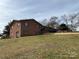 Exterior home shot of brick home on sloped lot at 356 Lucky Hollow Rd, Hickory, NC 28601