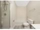 Bathroom featuring a shower, tub, toilet and neutral color palette at 4528 Potters Glen Rd, Charlotte, NC 28269