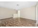 Bedroom with hardwood floor and neutral color palette at 4528 Potters Glen Rd, Charlotte, NC 28269