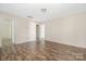 Bedroom with hardwood floor and neutral color palette at 4528 Potters Glen Rd, Charlotte, NC 28269