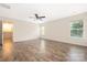 Bedroom features natural light from two windows and wood floors at 4528 Potters Glen Rd, Charlotte, NC 28269