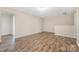 Bedroom with hardwood floor and neutral color palette at 4528 Potters Glen Rd, Charlotte, NC 28269