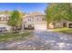 Two-story home with a well-manicured lawn, a two-car garage, and a long concrete driveway at 4528 Potters Glen Rd, Charlotte, NC 28269