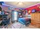 A creative bedroom featuring vibrant colors and playful sports-themed decor accents at 4605 Austin Rd, Monroe, NC 28112