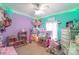 Bright, colorful bedroom with lofted bed, ample storage, and play space at 4605 Austin Rd, Monroe, NC 28112