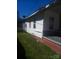 Exterior view featuring white siding and brick foundation at 544 3Rd St, Chester, SC 29706