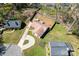 An aerial view shows the property and a well-maintained backyard with an abundance of green space at 5501 Joyce Dr, Charlotte, NC 28215