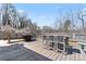 Backyard deck with grill and table, great for outdoor entertaining at 5501 Joyce Dr, Charlotte, NC 28215