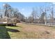 Large backyard with deck and plenty of open space, perfect for recreation at 5501 Joyce Dr, Charlotte, NC 28215