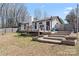 Backyard featuring a deck and garden boxes offering outdoor enjoyment at 5501 Joyce Dr, Charlotte, NC 28215