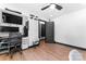 Spacious home office featuring ceiling fan, recessed lighting, and hardwood floors at 5501 Joyce Dr, Charlotte, NC 28215