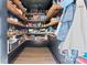 Walk-in pantry with custom shelving, providing ample storage for food and supplies at 5501 Joyce Dr, Charlotte, NC 28215