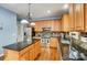 Well-appointed kitchen with granite countertops, stainless steel appliances, and ample cabinet space at 5807 Mctaggart Ln, Charlotte, NC 28269
