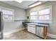 Bright kitchen with lots of natural light and tile flooring at 610 Hawthorne Ln, Charlotte, NC 28204