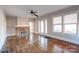 Bright living room featuring a fireplace, large windows, and hardwood floors at 610 Hawthorne Ln, Charlotte, NC 28204