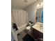 Well-maintained bathroom featuring a vanity, toilet, and bathtub with shower at 8603 Westhope St, Charlotte, NC 28216