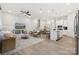 Bright and airy living room with open layout flowing into the kitchen and dining areas at 8635 Miles Gap Rd, Indian Land, SC 29707