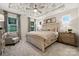 Relaxing main bedroom with decorative ceiling, neutral colors, ample natural light, and an accent chair at 8635 Miles Gap Rd, Indian Land, SC 29707