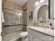 Bathroom featuring glass shower, tile surround, and vanity sink at 9607 Kestral Ridge Dr, Charlotte, NC 28269