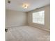 Bedroom featuring neutral paint and carpet at 9607 Kestral Ridge Dr, Charlotte, NC 28269