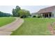 Scenic view of a golf course from the property, showcasing lush greenery and a well-maintained landscape at 9607 Kestral Ridge Dr, Charlotte, NC 28269