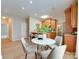Well-appointed kitchen with stainless steel appliances, a breakfast bar, and an adjacent dining area at 9607 Kestral Ridge Dr, Charlotte, NC 28269