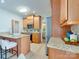 Well-lit kitchen with stainless steel appliances, granite countertops, and a breakfast bar at 9607 Kestral Ridge Dr, Charlotte, NC 28269