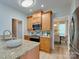 Kitchen features stainless steel appliances, tile backsplash, and wood cabinets at 9607 Kestral Ridge Dr, Charlotte, NC 28269