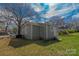 The exterior features gray siding, a white door, and green grass at 1001 Craven Ave, Kannapolis, NC 28083