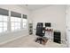 Functional office space with modern desk setup, roller blinds, and natural light at 1032 Barnette Farm Ln, Monroe, NC 28110