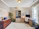Inviting office space with custom built-ins, ample natural light, and a cozy ambiance at 10547 Skipping Rock Nw Ln, Concord, NC 28027