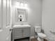 Stylish bathroom with gray vanity, modern fixtures, and a neutral color scheme at 106 Desert Sky Ct, Statesville, NC 28625