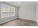Bright bedroom with a ceiling fan and double windows that allow for plentiful natural light at 106 Desert Sky Ct, Statesville, NC 28625