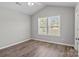 Bright bedroom with a vaulted ceiling, ceiling fan, and double windows that allow for plentiful natural light at 106 Desert Sky Ct, Statesville, NC 28625